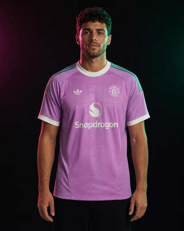 Manchester United 2026–27 pink Away Goalkeeper AI-generated editorial shirt visual on a fictional male model, not a product photo
