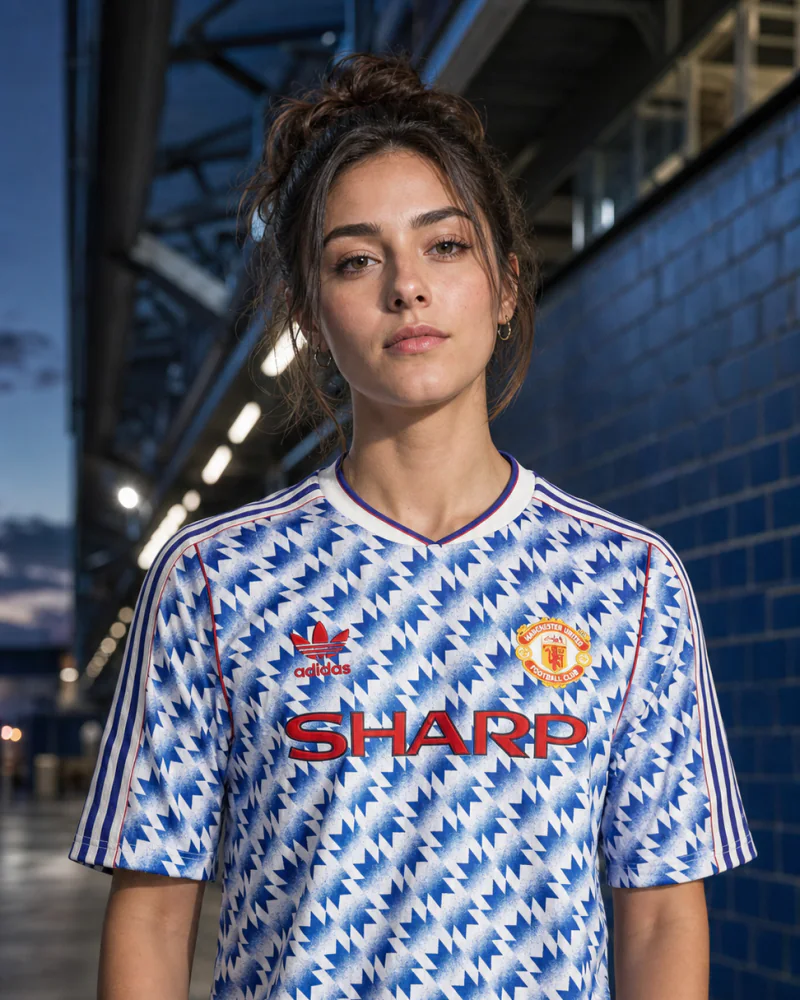 Fictional supporter wearing an editorial reconstruction of the Manchester United 1990-92 Adidas snowflake away shirt